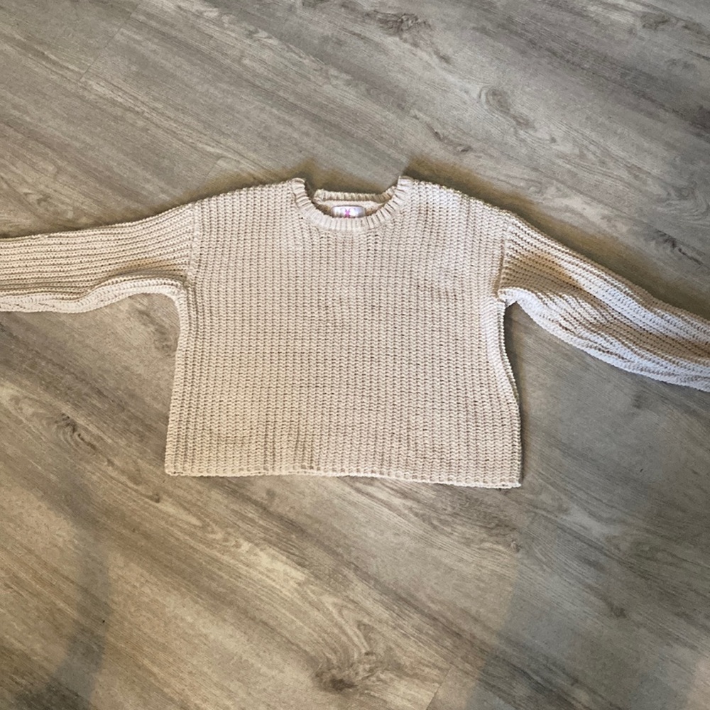 This sweater is from Chloe + Cyrus the size is a medium in a tannish color